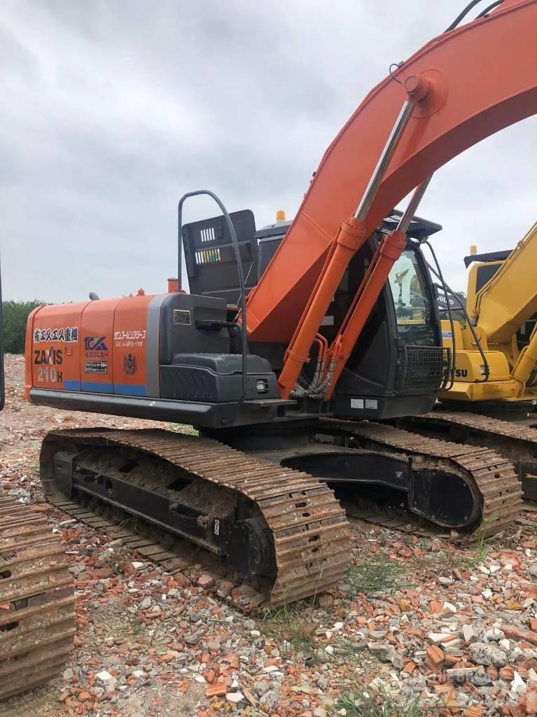 Hitachi ZX 210 Гусеничні екскаватори