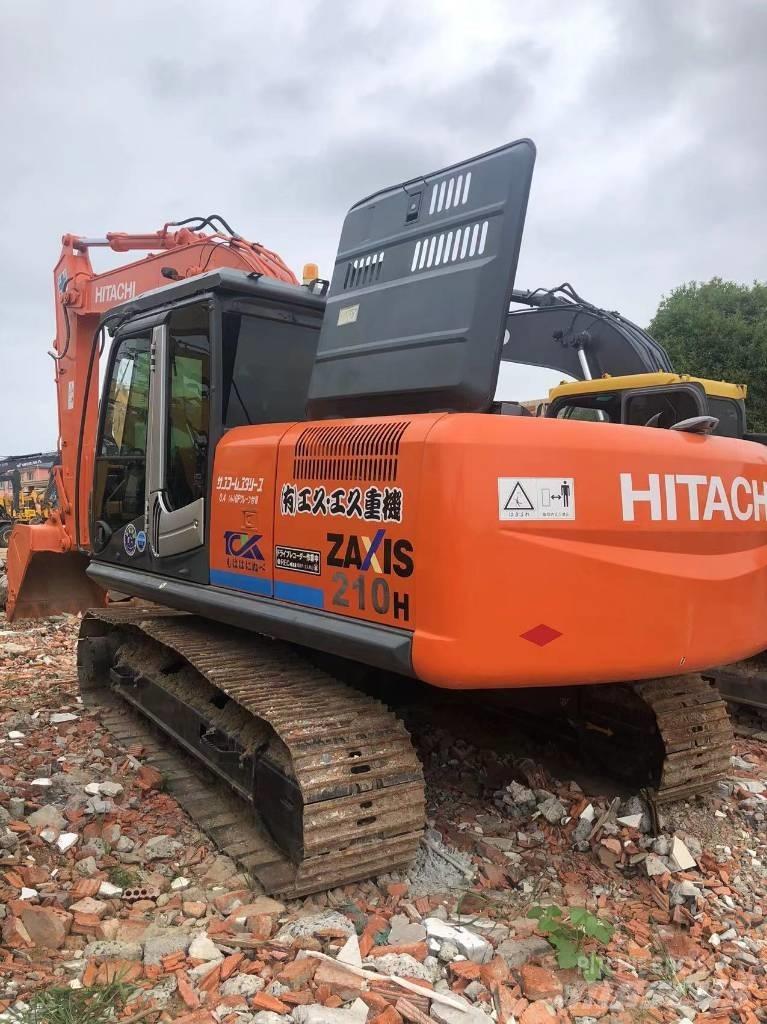 Hitachi ZX 210 Гусеничні екскаватори