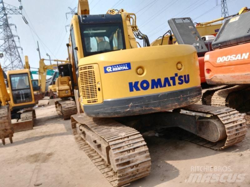 Komatsu PC 128 US-8 Середні екскаватори 7т. - 12т.