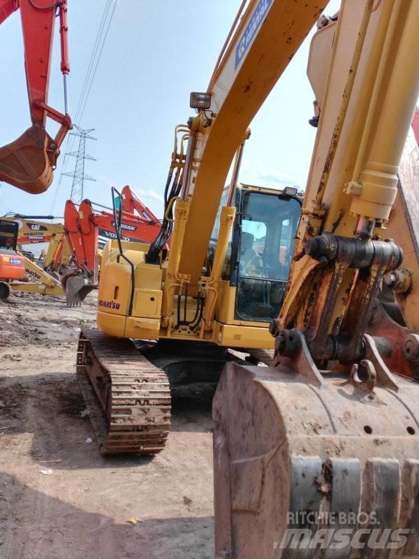 Komatsu PC 128 US-8 Середні екскаватори 7т. - 12т.