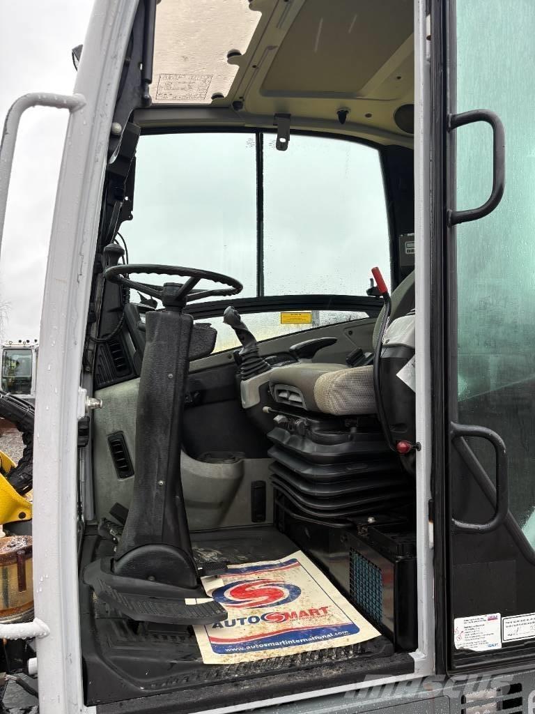 Wacker Neuson EW65 Колісні екскаватори