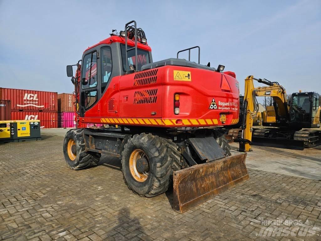 Doosan DX 140 W-3 Колісні екскаватори