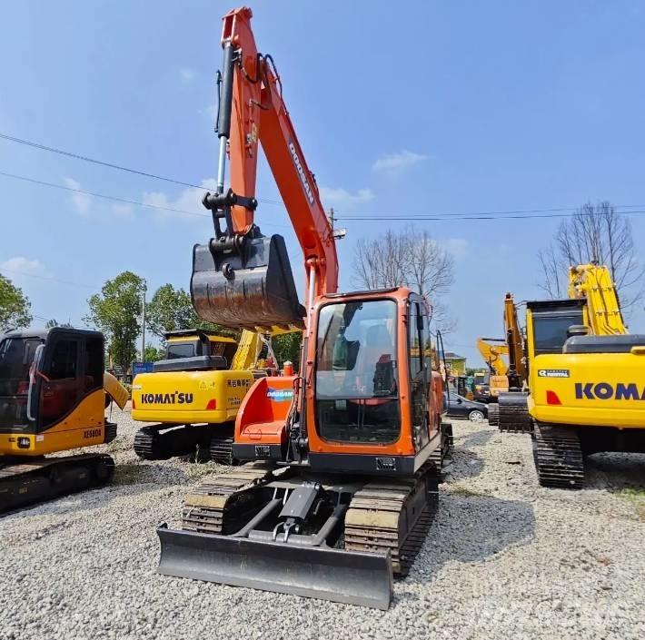 Doosan DX75-9C Середні екскаватори 7т. - 12т.