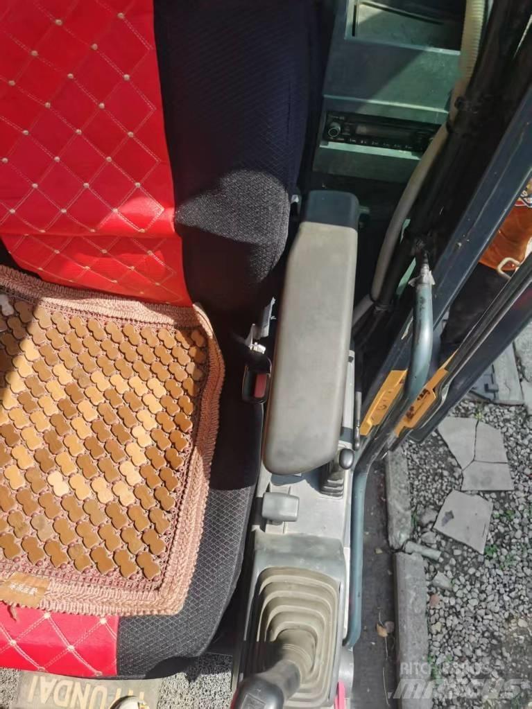 Hyundai 210w-9 Колісні екскаватори