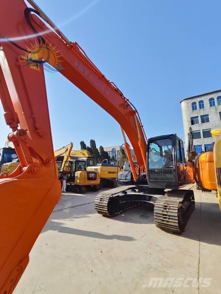 Hitachi ZX 210 Гусеничні екскаватори