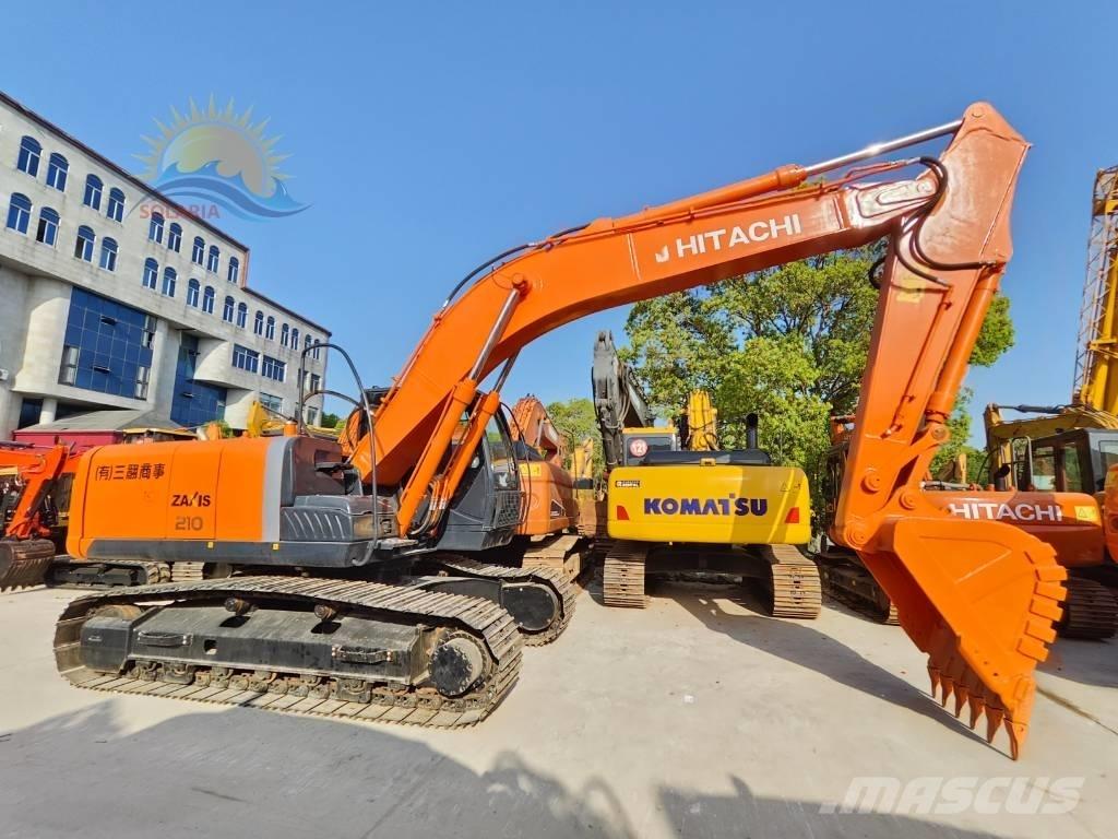 Hitachi ZX 210 Гусеничні екскаватори