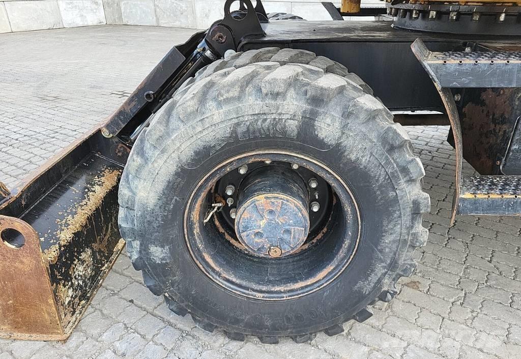 CAT M313 D Колісні екскаватори