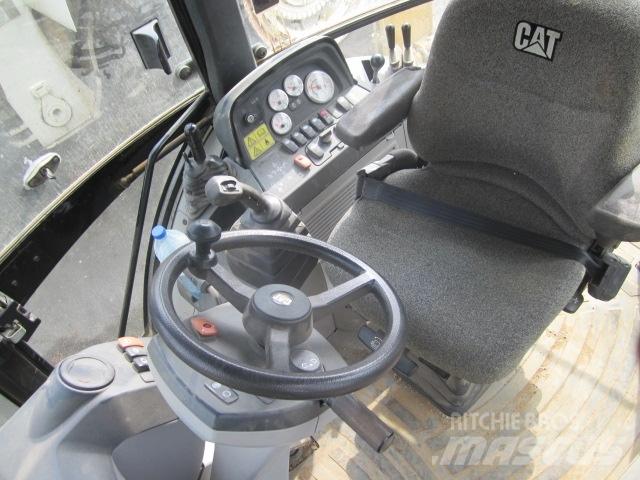 CAT 428E 4x4 Екскаватори-навантажувачі