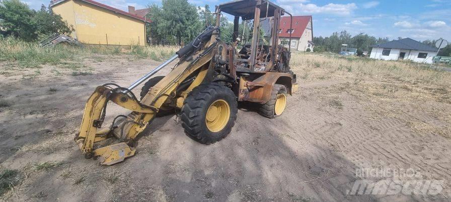 CAT 908 spoon Траншейні екскаватори