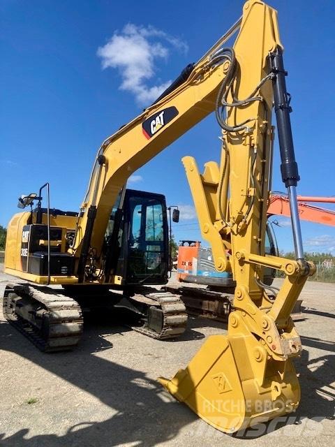 CAT 312 E Гусеничні екскаватори
