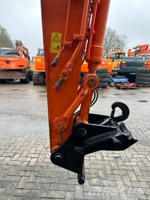Hitachi ZX140W-5B Колісні екскаватори