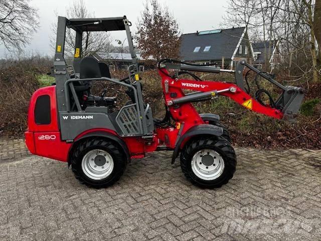 Weidemann 1280 Багатофункціональне обладнання для вантажних і землекопальних робіт
