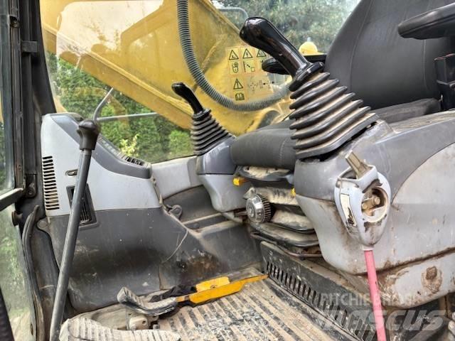 Komatsu PC 210 Гусеничні екскаватори