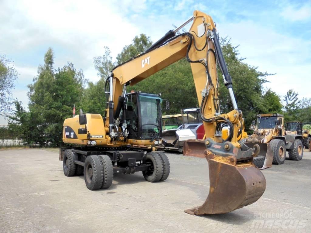 CAT M 316 D Колісні екскаватори