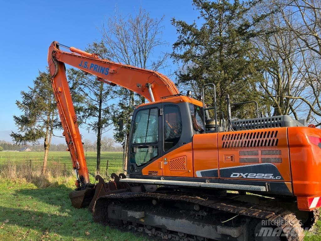 Doosan Dx225-5 Екскаватори з великим вилітом