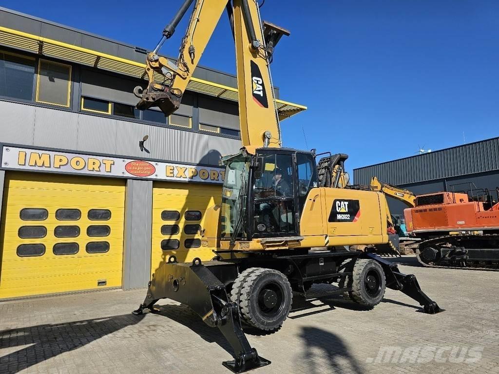 CAT MH 3022 Колісні екскаватори