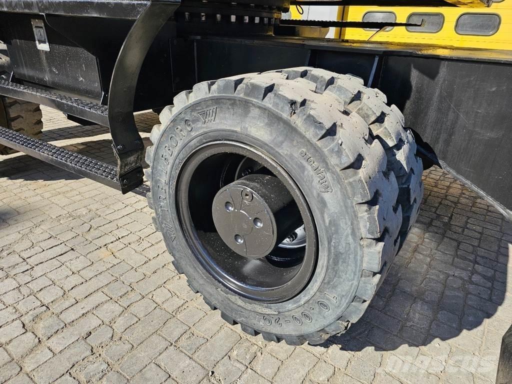 CAT MH 3022 Колісні екскаватори