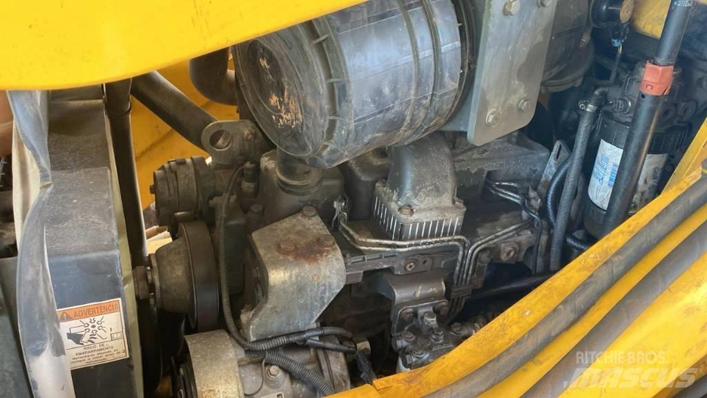 New Holland B 95 B Екскаватори-навантажувачі