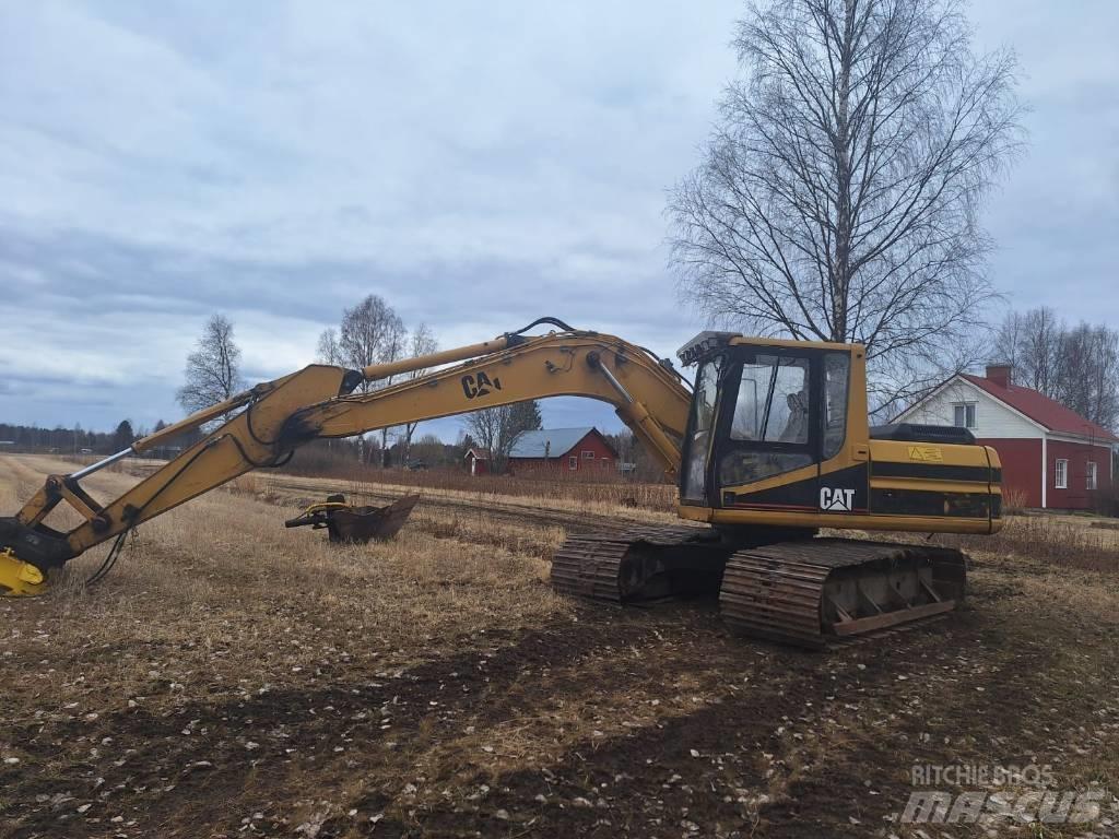 CAT 317 Гусеничні екскаватори
