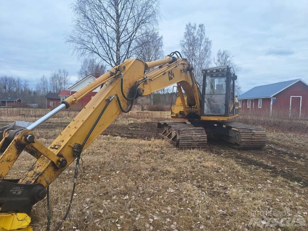 CAT 317 Гусеничні екскаватори
