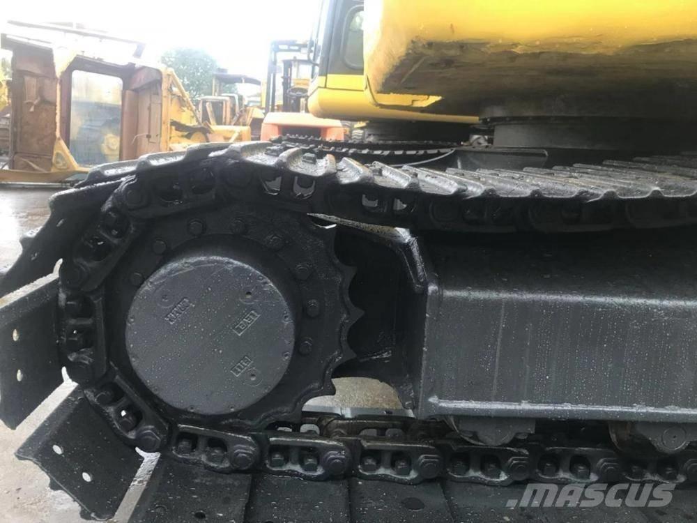 Komatsu pc78us Середні екскаватори 7т. - 12т.