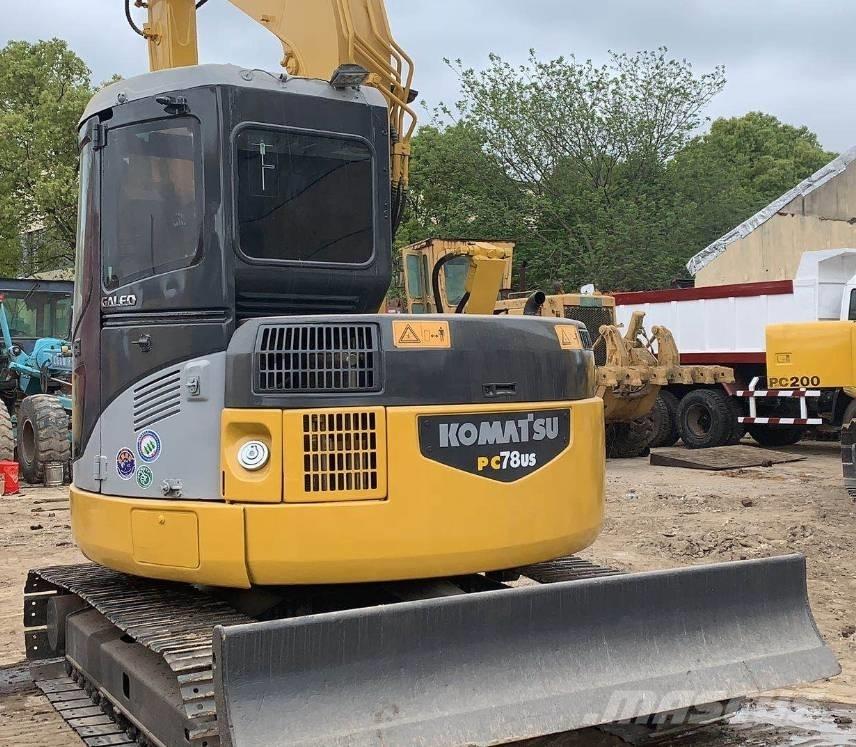 Komatsu pc78us Середні екскаватори 7т. - 12т.