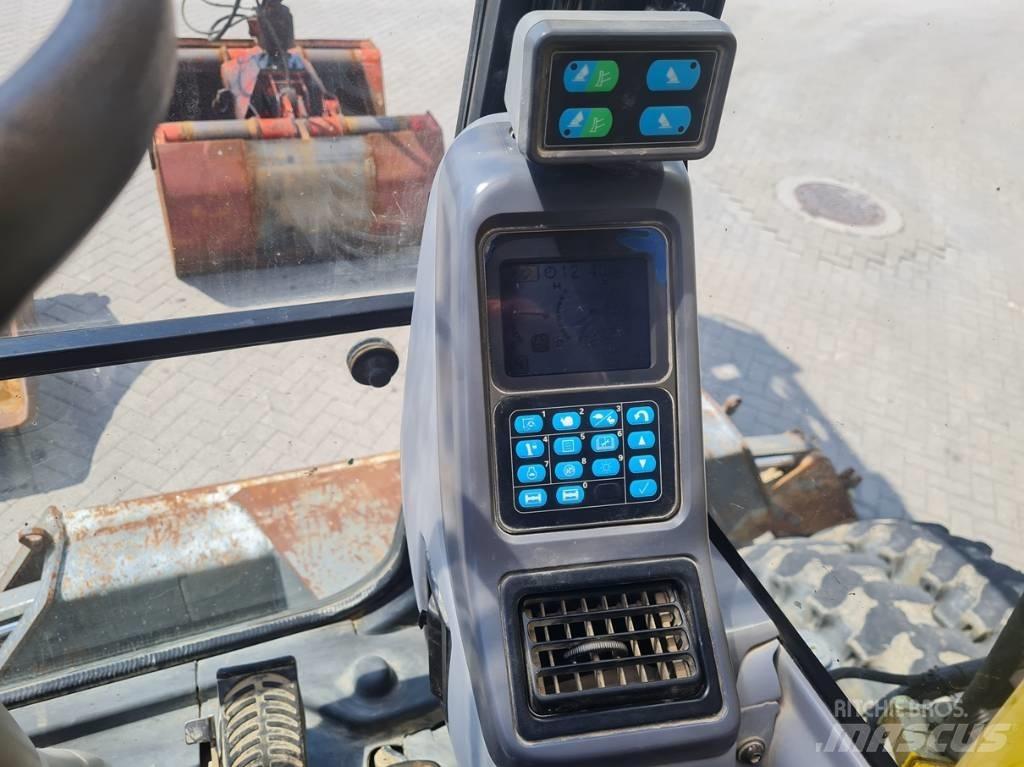 Komatsu PW 140-7 Колісні екскаватори