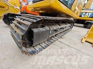 CAT 323 Гусеничні екскаватори