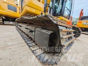 CAT 323 Гусеничні екскаватори