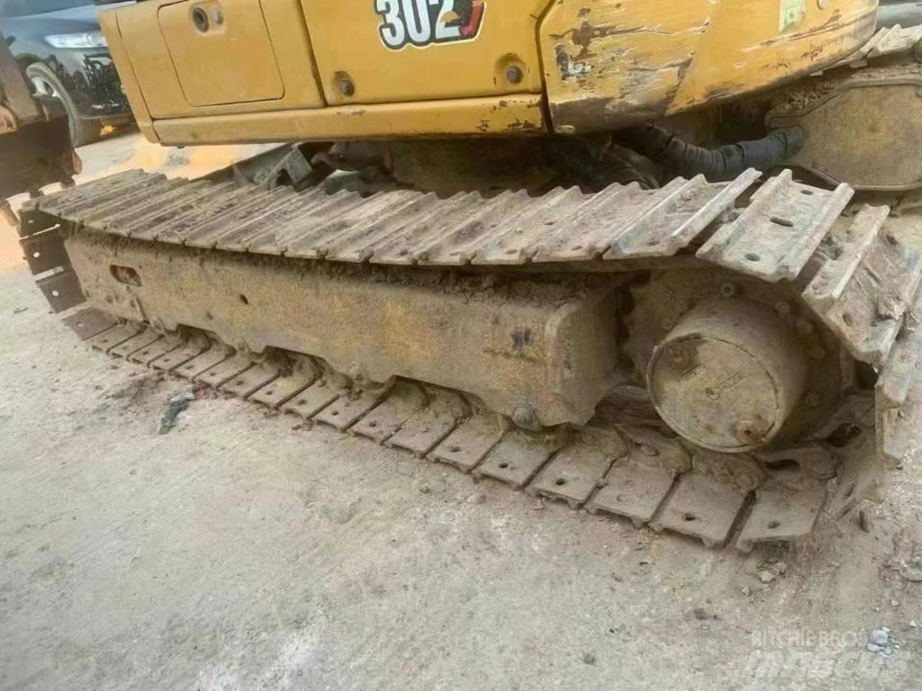CAT 302 Міні-екскаватори < 7т