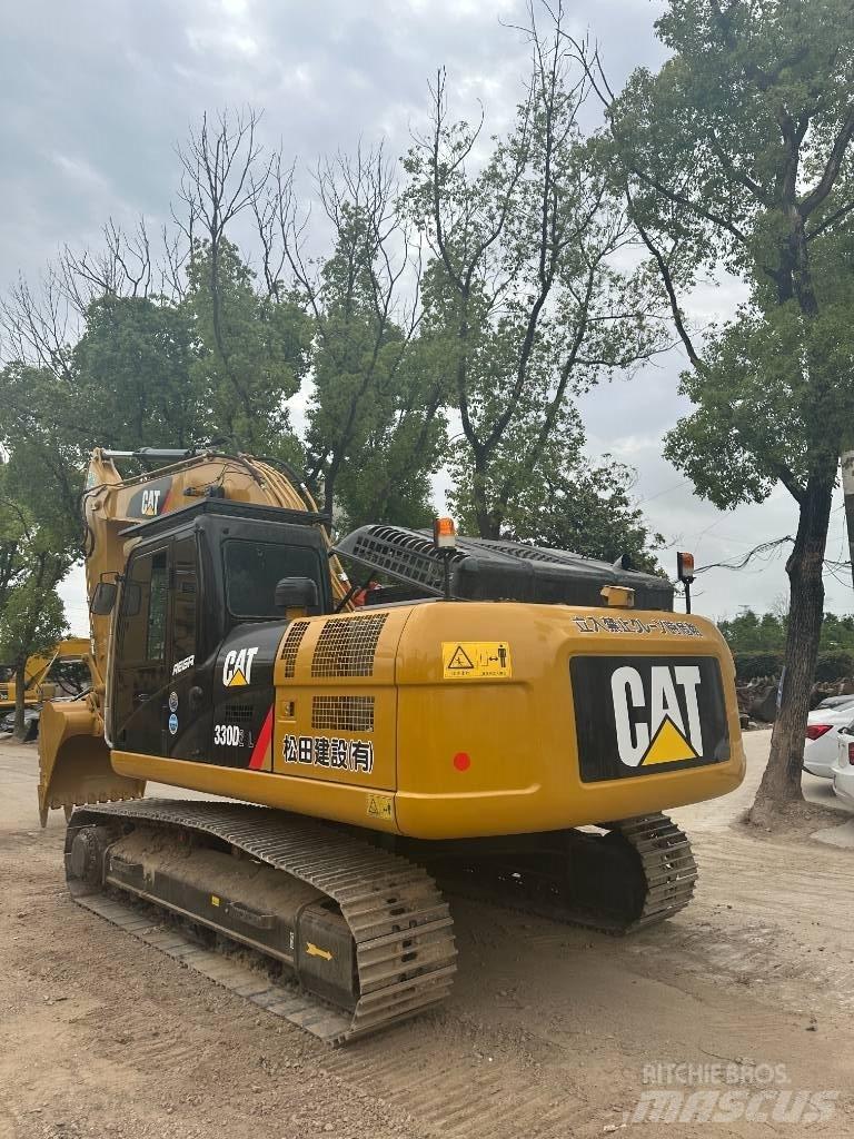 CAT CAT330D Середні екскаватори 7т. - 12т.