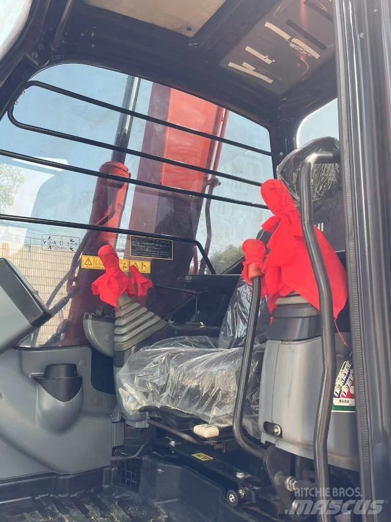 Hitachi ZX 70 Гусеничні екскаватори