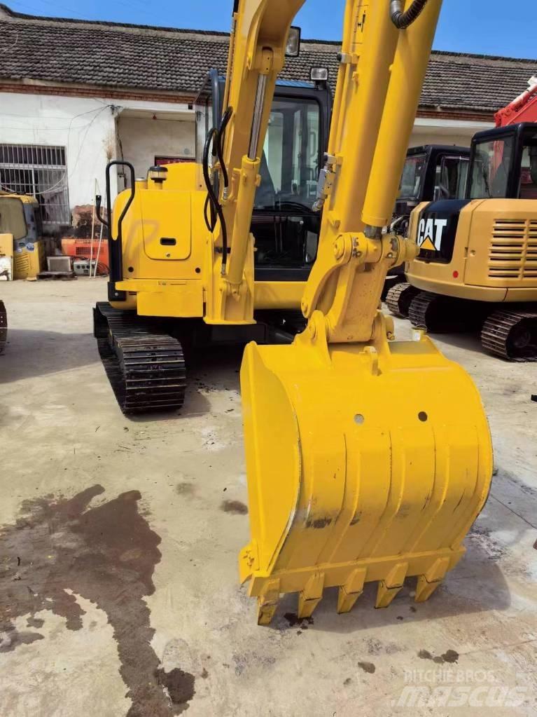Komatsu PC56 Міні-екскаватори < 7т