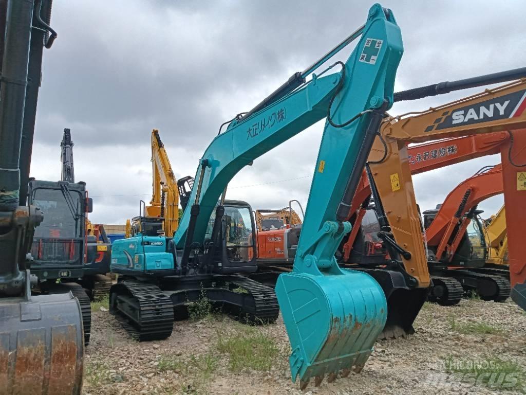 Kobelco SK 210 Середні екскаватори 7т. - 12т.