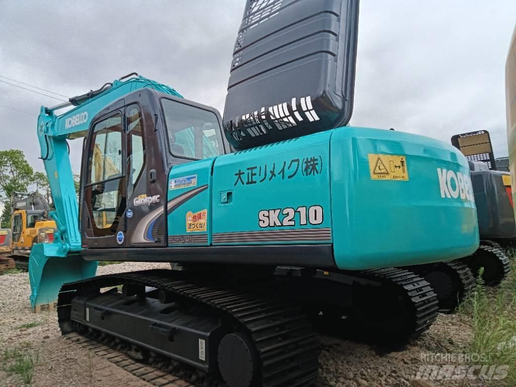 Kobelco SK 210 Середні екскаватори 7т. - 12т.