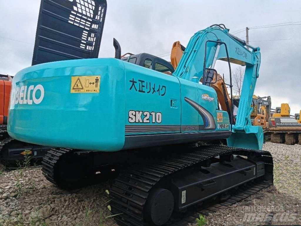 Kobelco SK 210 Середні екскаватори 7т. - 12т.
