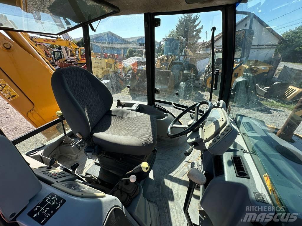 Fermec 860 Екскаватори-навантажувачі