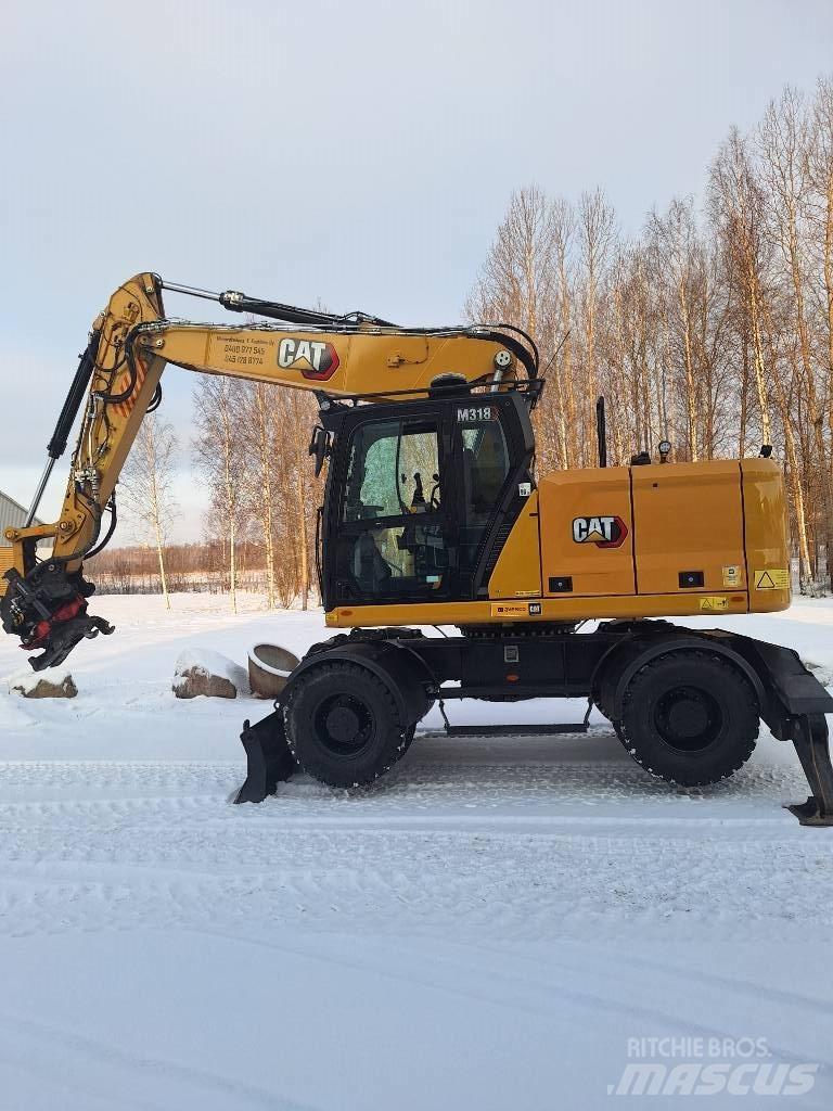 CAT M 318 Колісні екскаватори