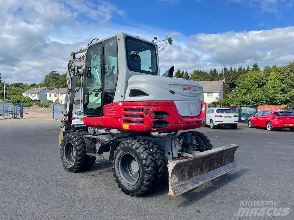Takeuchi TB295W Колісні екскаватори