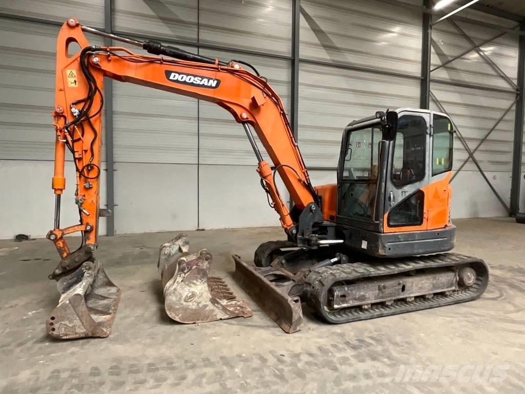 Doosan DX 80 R Середні екскаватори 7т. - 12т.
