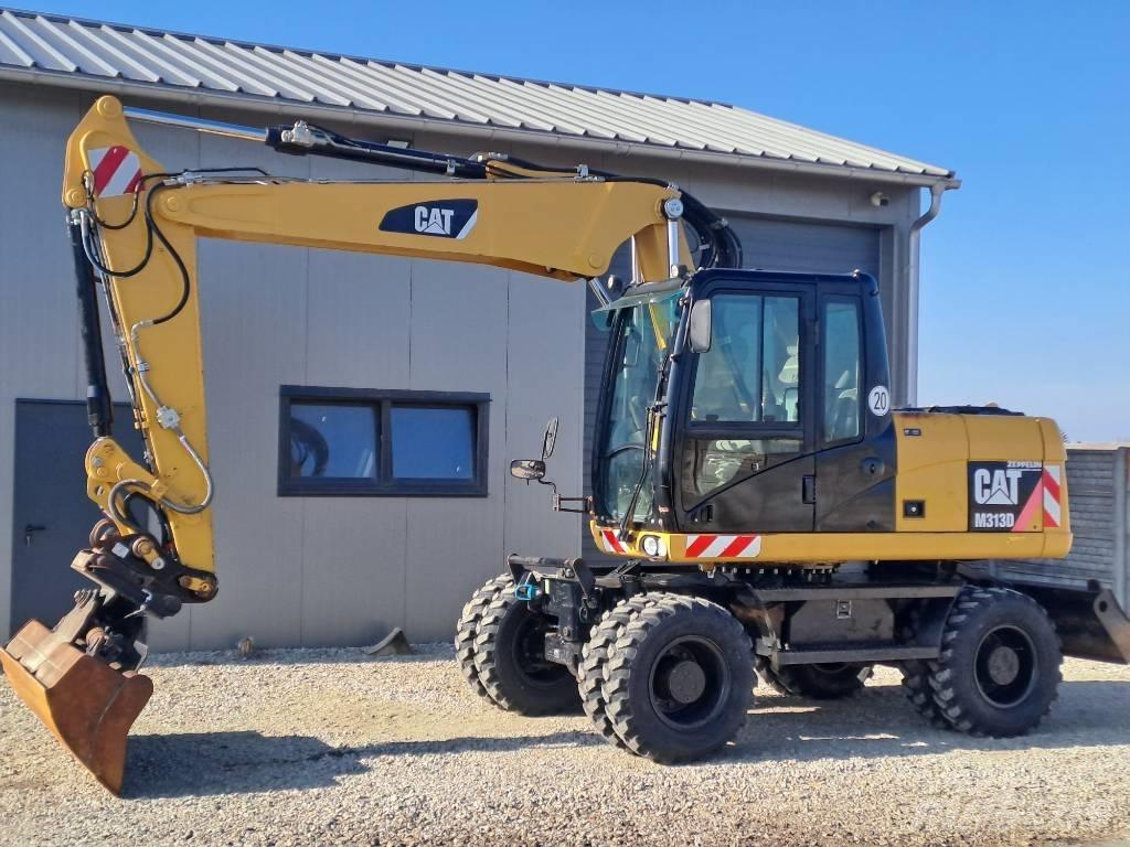 CAT M 313D Колісні екскаватори