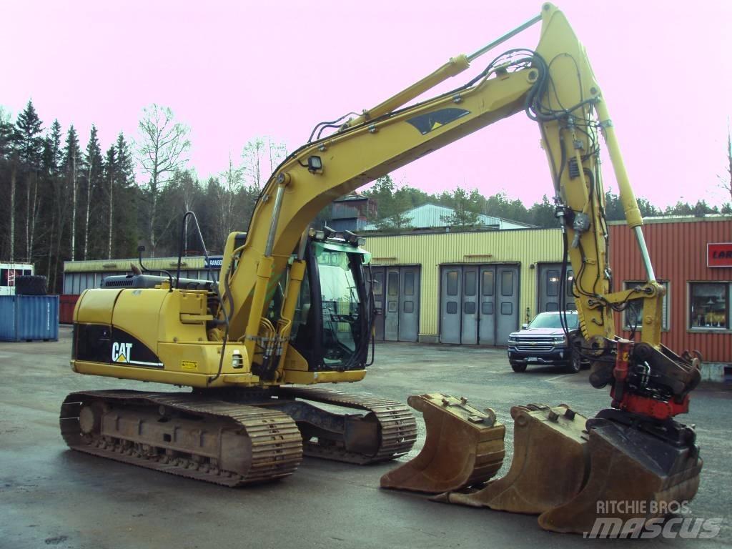 CAT 312 C Гусеничні екскаватори