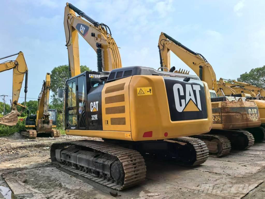 CAT 329 E Гусеничні екскаватори