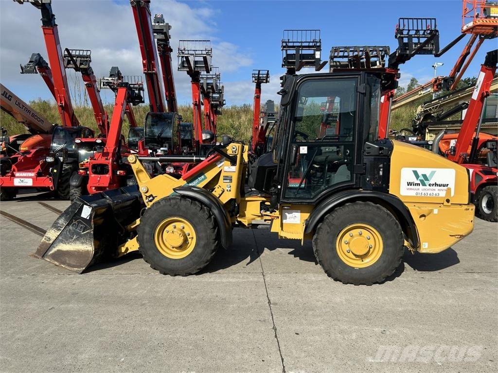 CAT 906 (9145) Багатофункціональне обладнання для вантажних і землекопальних робіт