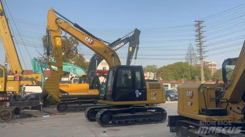 CAT 313 D Гусеничні екскаватори