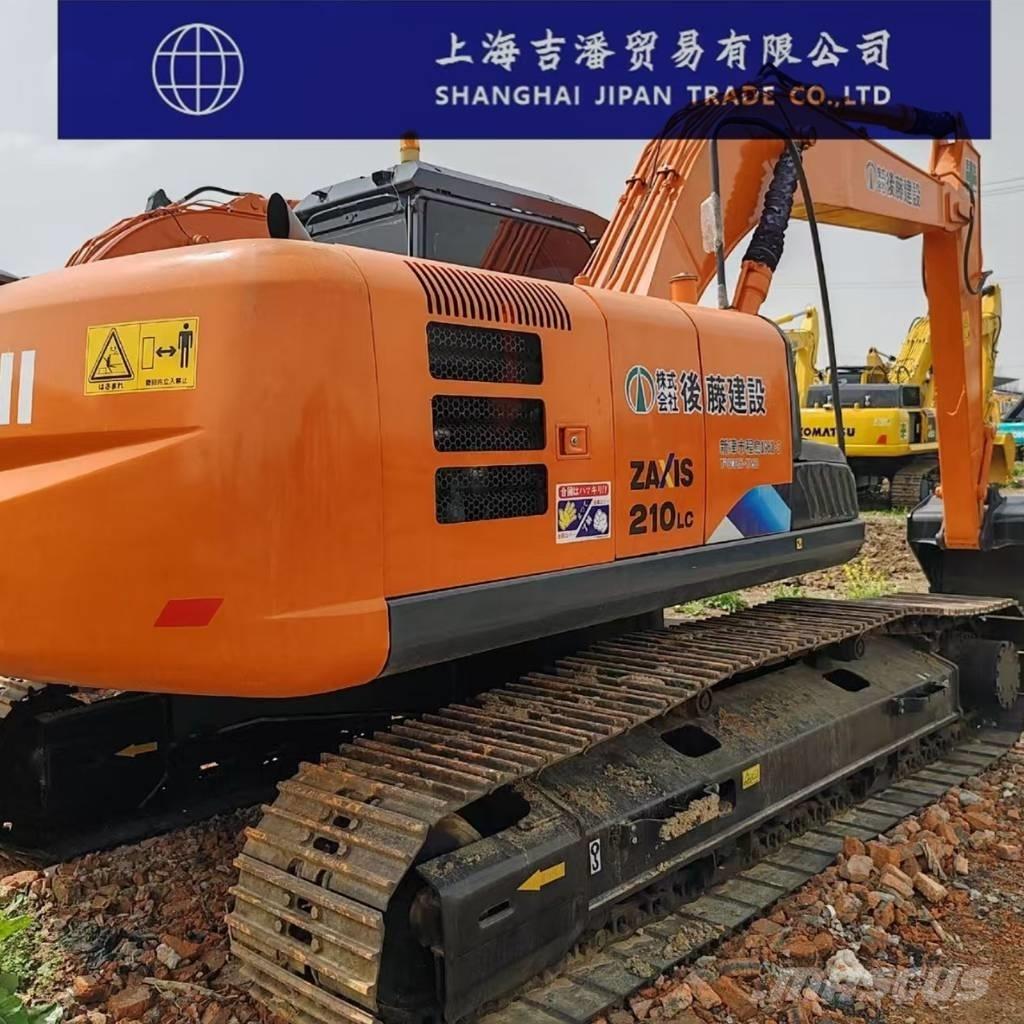Hitachi ZX 210 Гусеничні екскаватори