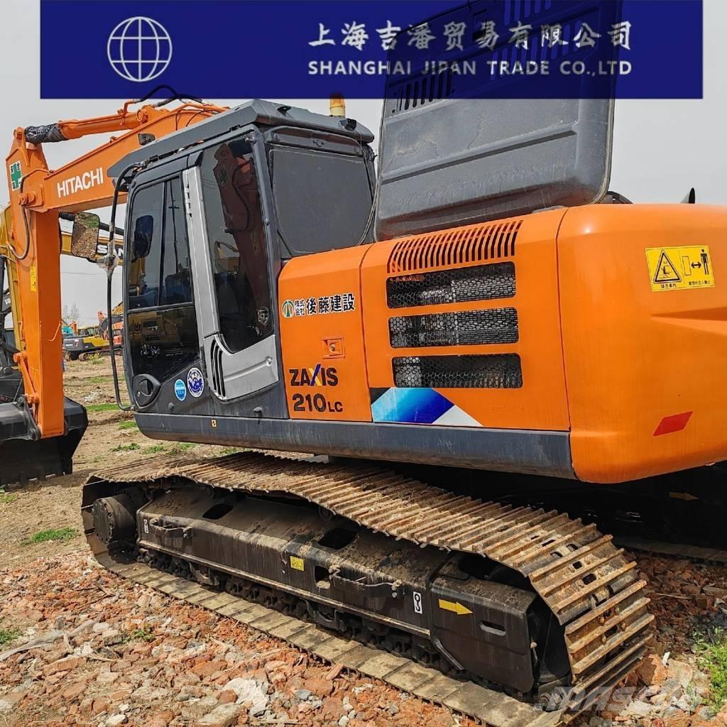Hitachi ZX 210 Гусеничні екскаватори