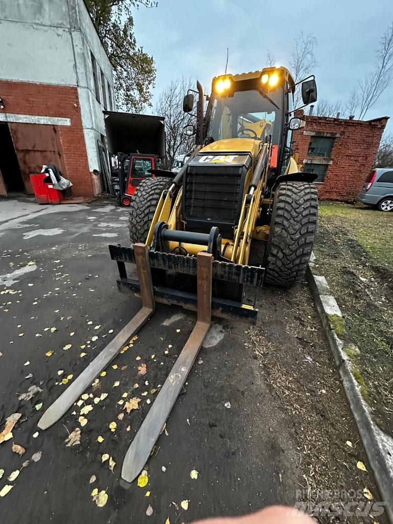 CAT 444F Екскаватори-навантажувачі