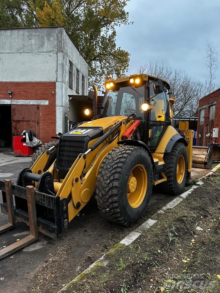 CAT 444F Екскаватори-навантажувачі