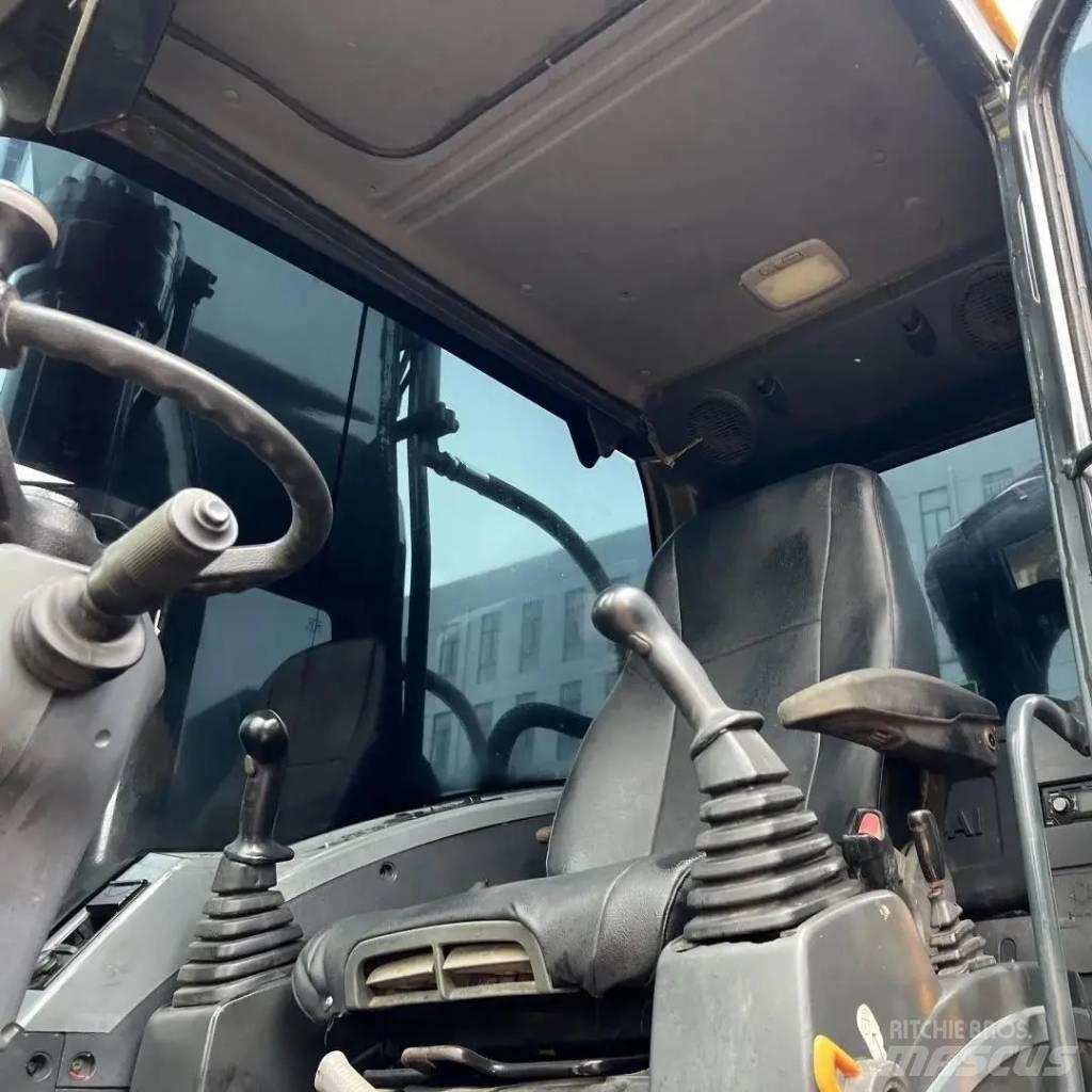 Hyundai R210W-9 Колісні екскаватори